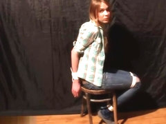 CHAIR TIED IN JEANS