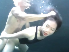 swimsuit girl sex with a guy underwater