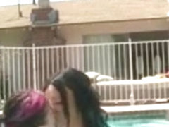 Goth lesbians outdoor in pool getting hot