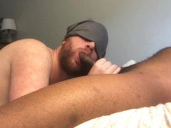 White guy sucking on big black cock