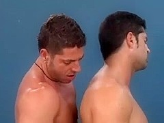 Lascivious homosexual hunks kiss and fuck in front of the camera