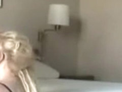 dumb blond bitch is blowing a fat guys little dick